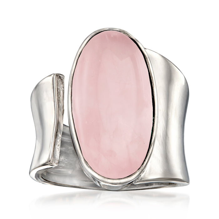 Sterling silver wrap ring with oval pale pink rose quartz gemstone, bezel-set.