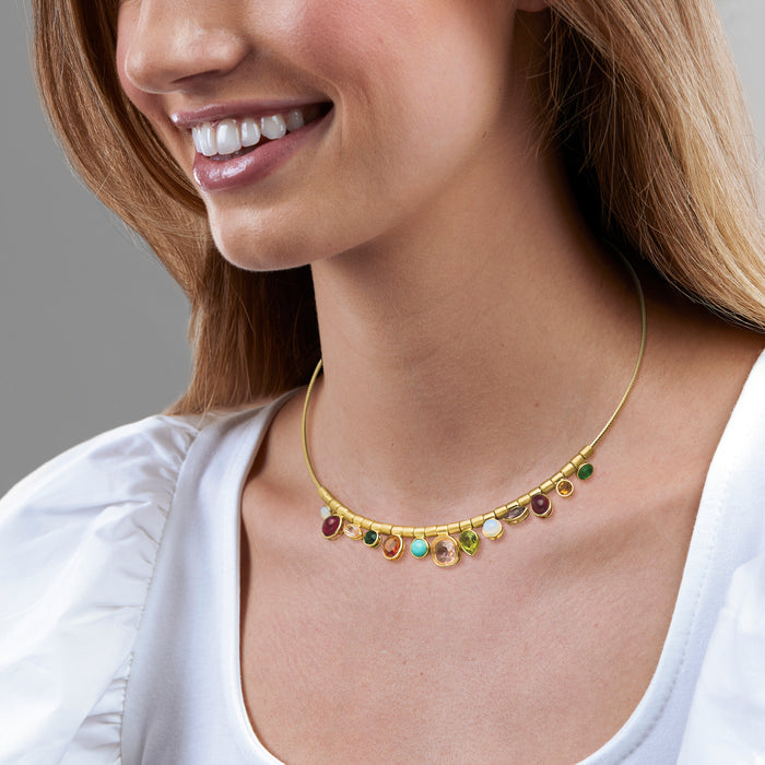 Gold-plated gemstone necklace with a row of round multicolored stones on chain