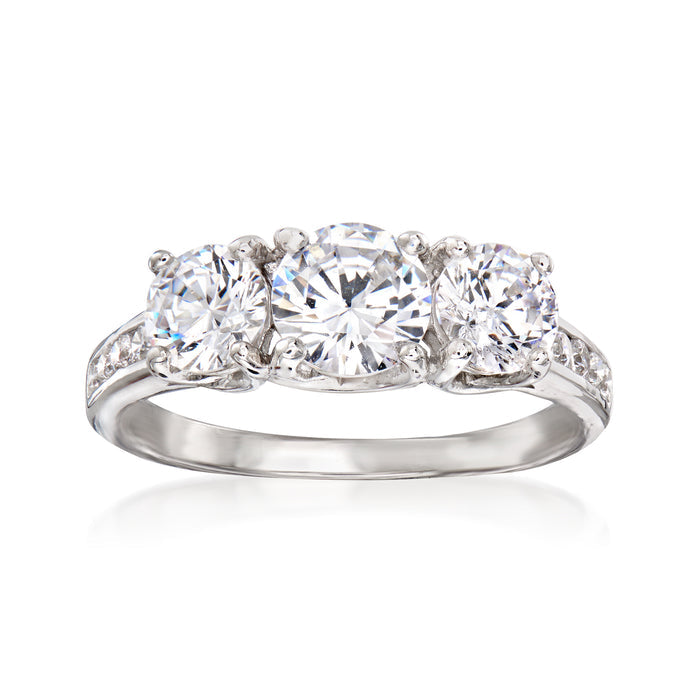Three-stone CZ ring in sterling silver, three round stones in shared prong setting