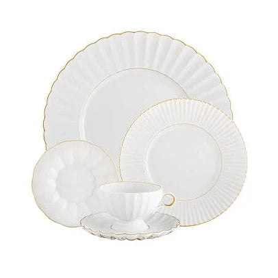 The Vista Alegre 200 Anos Dinnerware set features white porcelain with scalloped edges, hand-painted gold trim, and modern elegance. Includes dinner plate, salad plate, bread plate, teacup, and saucer—all displayed on a white background.