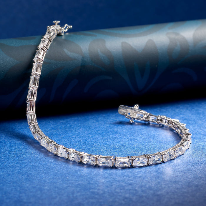 Sterling silver baguette CZ tennis bracelet with clear rectangular stones, side profile