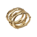 The Kim Seybert Bamboo Napkin Ring Gold Set of 4 features three textured, interwoven bands with a faux bamboo design—an elegant gold accent for your table setting.