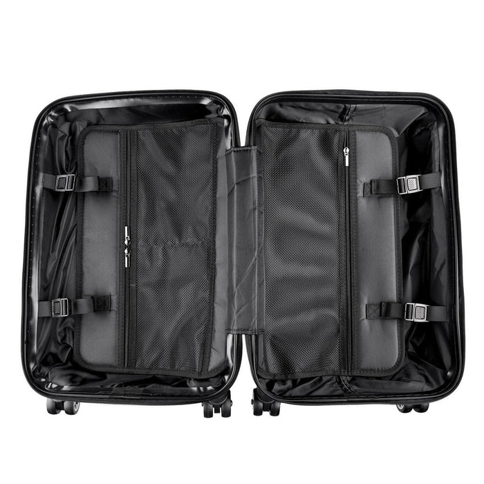 Black suitcase with open compartments on a white background