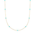 Turquoise bead station necklace with 14kt yellow gold chain and small round blue beads