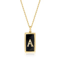 Gold initial pendant necklace with black onyx rectangle and diamond letter A