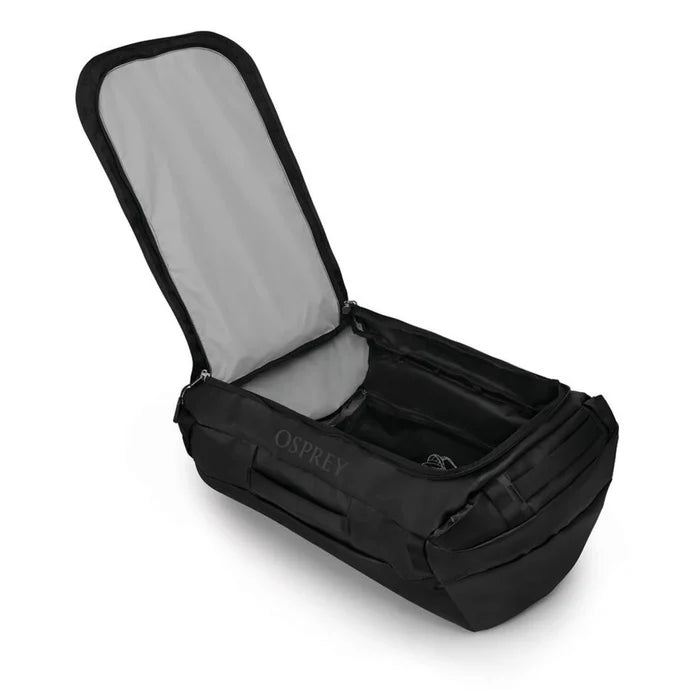 Open View – Osprey Transporter Duffel 65 in Raven Black with main compartment unzipped, showing interior mesh organization pockets.