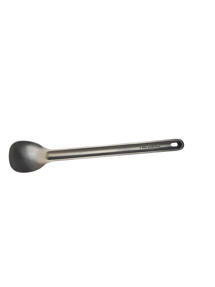 Red Beard’s Outfitter long handle titanium backpacking spoon on a transparent background